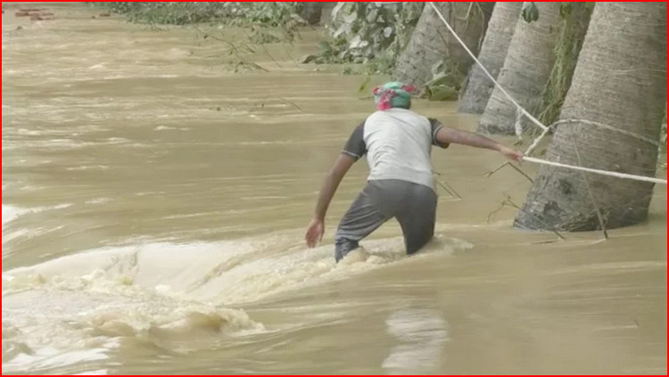 বাঁধ-ভাঙা বন্যায় ৬০ জনের প্রাণহানি